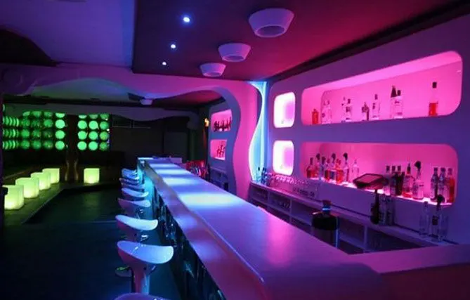 Cocktail bar counter with ambient lighting