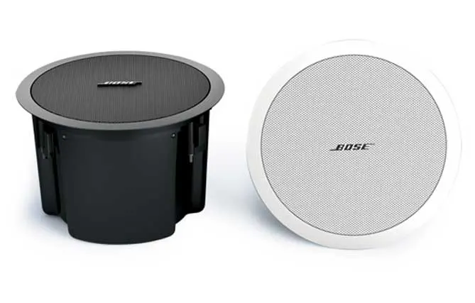BOSE speakers for hidden installation in ceiling or wall, available in black or white